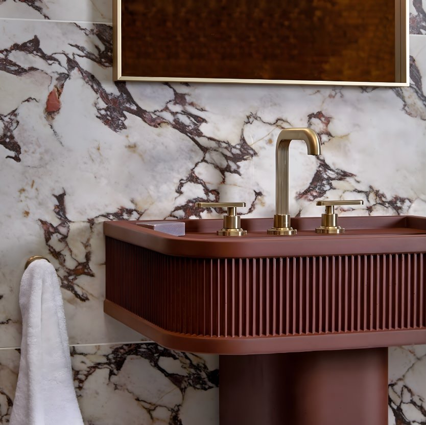 maroon colour pedestal basin